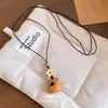 Collares de oso, cachorro y ballena de madera, cadenas para suéteres retro vintage, accesorios de lujo ligero de alta gama al por mayor
