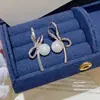 Pendientes de Moda de Aguja de Plata 925 con Cubos de Perla de Venta Caliente Pendientes Dulces de Nicho de Gama Alta Pendientes de Diseño Exquisito