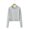 7637-25 Novo Estilo de Verão Estilo Retro Americano Cor Lisa Simples Básico Gola Redonda Manga Longa Cardigan Tricô