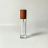 Atacado Pronta Entrega Frasco de Perfume de Vidro Cilíndrico com Tampa de Baioneta 15ml Frasco Dosador para Cosméticos Spray de Pressão com Tampa de Madeira