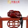 Palo de Rosa Hoja de Loto Vaca Pieza de Mano Yiming Xianyuan Talla en Madera Maciza Zodiaco Vaca Juguete Portátil y Regalo