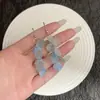 Brincos de Borla Personalizados com Pétalas em Gradiente Azul Frio, Design de Luxo Leve e Elegância Etérea