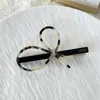 Pinza para el pelo de temperamento simple clip para flequillo biselado clip de pico de pato hueco de alto sentido clip superior tocado al por mayor