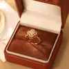 Anillo Abierto Giratorio de Circonita con Trébol de Cuatro Hojas Micro-Pavimentado Moda Lujo Accesible Nicho Moda Exquisita Anillo Ajustable para Mujeres
