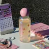 Taza de vidrio de borosilicato alto resistente a altas temperaturas taza láser para niñas alto valor de color taza pequeña portátil para sorber taza de agua fresca de verano