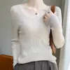 Camiseta básica de punto de lana fina con cuello bajo para mujer, estilo fino de otoño e invierno 2026, corte ajustado, adecuada para ir al trabajo