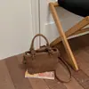 Bolso de Mano Tejido de Nueva Moda Otoño 2026 Alta Apariencia Calidad Textura Personalidad Bolso Cuadrado Pequeño Color Sólido Bolso de Hombro Único Cruzado