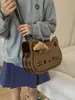 Mochila Bolso Gatito Tostada de Caramelo Linda Transfronteriza para Mujer 2025 Nueva Moda Tendencia Dibujos Animados Bolso de Hombro Cruzado