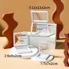 Caja colgante de película de PE de color de moda, película transparente, a prueba de polvo, para exhibir y empaquetar monedas, joyas y otros coleccionables
