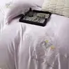 2026 Nuevo Estilo Tela Tencel Bordado Floral Conjunto de Cuatro Piezas Verano Conjunto Bordado de Tencel