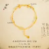 Tienda de oro con fuerte retención de color 24K oro brillante pulsera de dije de flor de cuatro hojas cuentas de transferencia versátil joyería ultrafina para novia