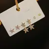 Pendientes pequeños de una semana, populares pendientes pequeños de aguja de plata S925, una tarjeta, tres pares de pendientes de combinación de traje, pendientes de circonita roja de red para mujer