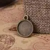 Nueva versión coreana de la joya del tiempo retro Sun Jewelry colgante de aleación de alta calidad DIY materiales hechos a mano al por mayor