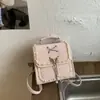 Mochila casual versátil de nicho con lazo transfronteriza para mujer, nuevo modelo 2026, linda mochila escolar estilo universitario, mochila de viaje