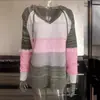 Suéter con capucha tejido para mujer Europeo y Americano de manga larga holgado moderno con costuras de rayas de colores suéter tejido con cordón para mujer