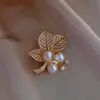 Broche novo estilo feminino senso de alta qualidade nicho broche atacado pino de alta qualidade temperamento fixo roupas terno joia pérola