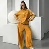Nuevo Top Casual de Moda Amazon Primavera y Otoño con Tres Rayas y Detalle de Botones, Chaqueta Deportiva Vintage con Cuello Alto