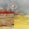 Almacén por departamento venta al por mayor vaso de agua de vidrio Mango de diamante Taza con asa vidrio doméstico estilo lindo creativo puesto de tienda de dos yuanes