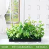 Simulação de paisagismo com plantas verdes jardineira floreira combinação de display flores artificiais biônicas decoração de paisagem interna divisória de planta tropical