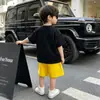 Conjunto Ligero de Verano para Niños 2026 Nuevo Conjunto Casual de Verano para Niños con Mangas Cortas y Shorts Atuendo de Dos Piezas Moderno
