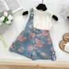 Ropa para niños al por mayor traje de niña verano 25 nuevo niña pequeña top sin mangas con shorts vaqueros estampados conjunto de dos piezas