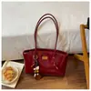 Bolsa Tote Grande para o Dia a Dia Feminina 2026 Nova Couro Encerado Simples Bolsa de Ombro Toque de Luxo Bolsa de Axila
