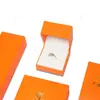 Joyería china papel imitación piel caja de joyería de ángulo recto caja de embalaje para anillos pulseras collares caja de regalo para joyería fábrica