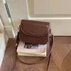 Bolso de mano personalizado nuevo para principios de otoño de 2026, moda estilo coreano, nicho, simple y elegante, color liso, bolso de hombro y bandolera para el día a día