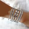 Joyería transfronteriza letras europeas y americanas moda patrón de golpeteo simple patrón de flecha diamante personalidad exagerada pulsera abierta