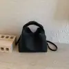 Bolsas de Nicho de Gama Alta para Mujer 2026 Nuevo Bolso de Hombro Cruzado Simple de Moda Bolso de Mano para Viaje Diario Bolso Cubo