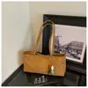 Bolsa de Ombro Transfronteiriça com Textura Retrô para Uso Diário Feminina 2026 Novo Estilo Moda Simples Bolsa Tote Bolsa de Ombro de Alto Valor