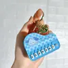 Nuevo Llavero de Mini Piano Transfronterizo Dibujo Animado Lindo Tocando el Piano Sanrio Juguete Musical Colgante Pequeño