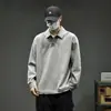 Nueva colección otoño/invierno: Sudadera casual para hombre, holgada y cómoda, con cuello polo, presenta un diseño de dos piezas simulado, en un estilo casual elegante inspirado en el estilo urbano americano y de Hong Kong