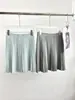 Cardigan de Tricô Color Block Gola Redonda Estilo College Mistura de Linho Novo Outono 2026 com Cintura Elástica Mini Saia Plissada