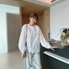 Nueva moda de otoño: camisa top de manga larga de ganchillo calada de alta gama, lujo ligero, rejuvenecedora, elegante, absolutamente hermosa e impresionante