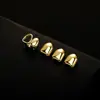 El Set de Hip-Hop Europeo y Americano Más Vendido de Amazon Diente de Oro Individual Cobre Color 18K Colmillos Halloween Hip-Hop Dientes Peculiares