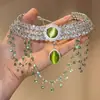 Collar multicapa de gota de agua con mariposa verde de alta gama para mujer, estilo moderno y genial, accesorio de cadena para clavícula de alta gama