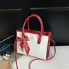Bolso de Mano de Seda con Bloques de Color de Moda 2026 Invierno Nueva Moda Simple Versátil Elegante Bolso de Hombro Cruzado