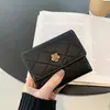 2026 Nova Carteira Pequena de Girassol Dobrável Versátil Retro Moda Porta-Moedas 70% de Desconto Porta-Cartão de Estudante