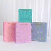 Bolsa de compras al por mayor con patrón geométrico, bolsa de mano estampada, bolsa para empaquetar dulces de fiesta, bolsa de regalo, bolsa de cartón blanco con bronceado