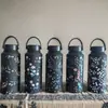 Nueva Botella de Agua Deportiva 316 Proceso de Pintura de Goma Acero Inoxidable Botella Espacial Asa Deportiva al Aire Libre Taza Térmica