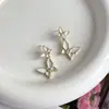 Exquisitos Pendientes Dobles de Mariposa con Esmalte de Goteo Rosa 2025 Nuevo Estilo Caliente Moda de Gama Alta Pendientes Únicos de Nicho Pendientes