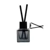 Botella de vidrio para perfume redonda plana, color negro degradado para ventilación de aire, adecuada para dormitorios y baños, botella difusora, botella de fragancia eliminadora de olores, botella vacía