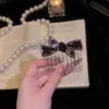 Nuevo peine invertido en forma de lazo, un accesorio para el cabello elegante y moderno para mujeres, perfecto para arreglar los cabellos sueltos y añadir un toque de elegancia y sofisticación