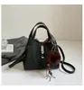 Bolsa de Mão Tipo Balde Texturizada de Nicho High-End para Mulheres, Novo Estilo Coreano Versátil Casual para Ombro Transversal Inverno 2025