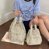 Mochila nueva para viajes diarios, mochila casual simple para el trabajo con bolsillos, versátil y ligera 2026