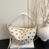 Bolso de mujer de gran capacidad, nuevo bolso tipo saddle vintage con tachuelas primavera-verano 2026, bolso de hombro y bandolera de alta gama para el trabajo