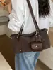 Bolso de hombro retro con acabado mate para mujer, nuevo estilo 2026, versátil para ir al trabajo, bolso bandolera de moda, bolso elegante para debajo del brazo, bolso baguette con un toque de alta gama