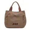 Bolsa de Lona com Letra Bordada para Mulheres Modelo 2025 Bolsa para Trabalho, Deslocamento, Almoço Bolsa de Mão Versátil Bolsa Tote Casual para Mulheres