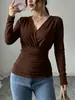 Nueva moda femenina transfronteriza europea y americana, camiseta de manga larga estilo francés con cuello en V cruzado, cintura fruncida ceñida, ajuste ceñido y adelgazante, top de otoño-invierno